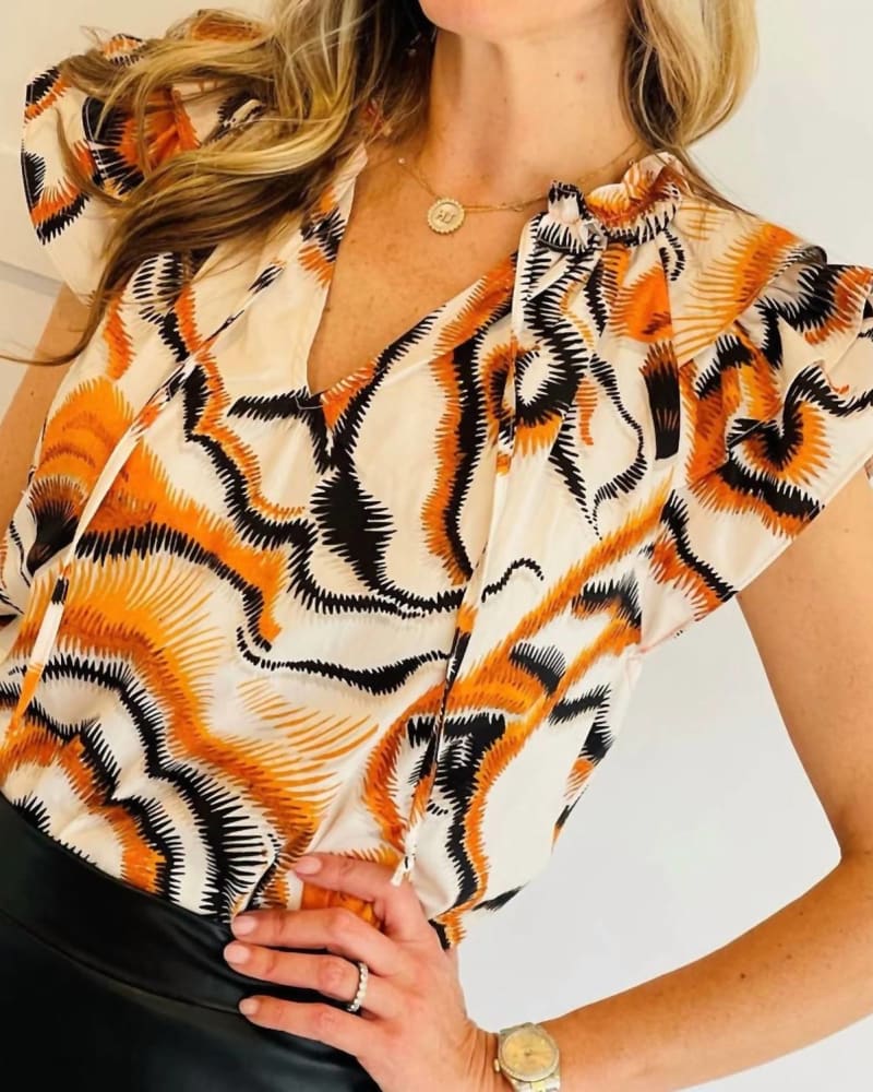 Front of a model wearing a size Large Marie Top in Multi in Multi by Willa Story. | dia_product_style_image_id:343727